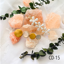 Load image into Gallery viewer, 2 hair clips yellow and warm rhinestone colors
